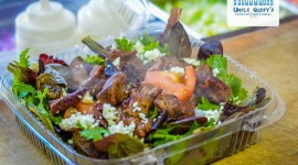 Greek salad with meat topping